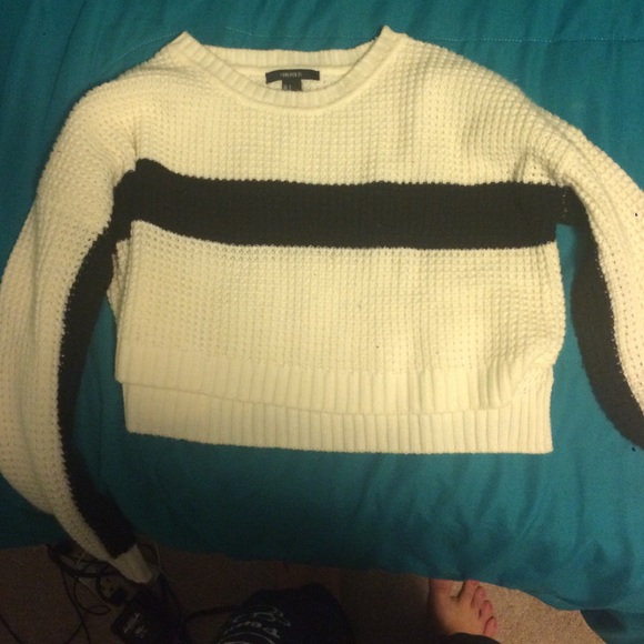 White sweater with a black stripe