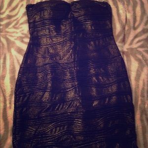 Skin tight little black dress