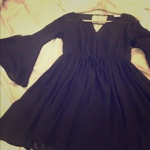 Mini sheer black top dress with bell sleeves!