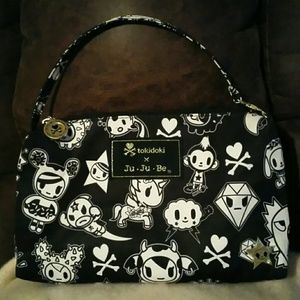 JuJuBe small purse, or small diaper bag.