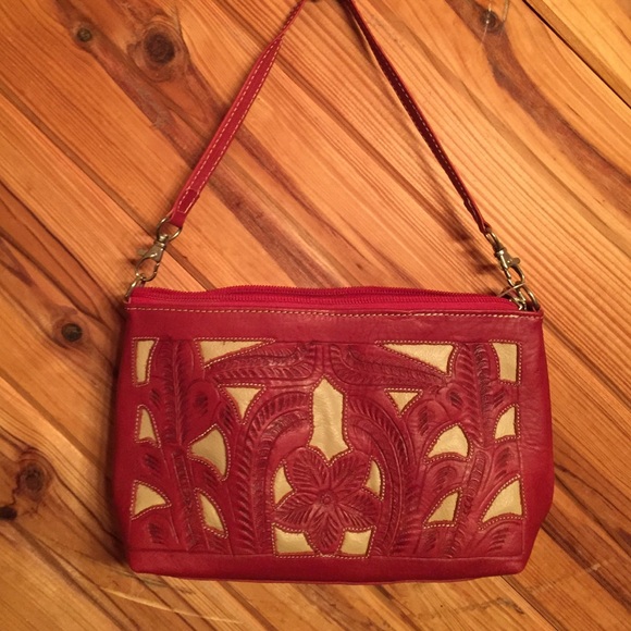 Red leather tolled purse.