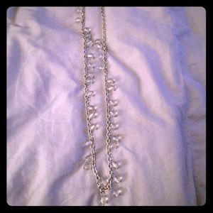 A clear long beaded silver loft  necklace!