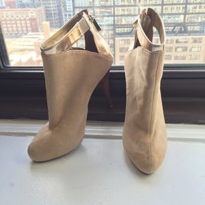 Metallic cutout boots