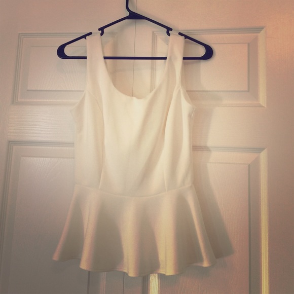 White peplum top with zippered back detail