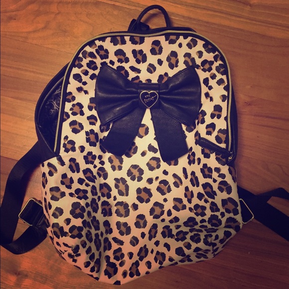 Leopard print  backpack with black and bow details
