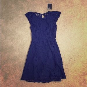 Never worn. NTW navy blue lace dress