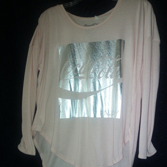 New pink short in the front long in the back shirt