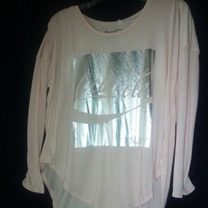 New pink short in the front long in the back shirt