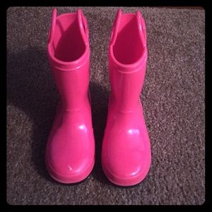 Pink rain boots