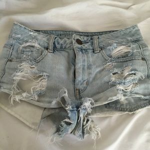 Destressed high rise shorts