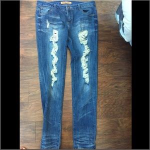 Celebrity pink ripped styled jeans