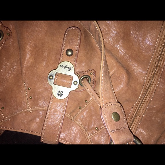 Mariposa purse never used it.