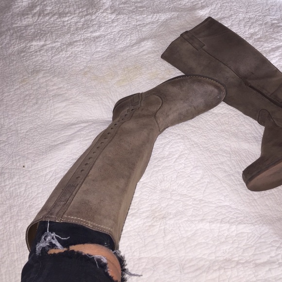 tall brown boots bought from a surf shop on Kauai.