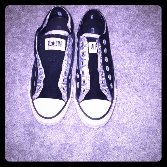 Black, white, and silver dual colored converse