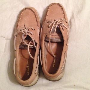 Cream colored boat shoes that have been worn once!