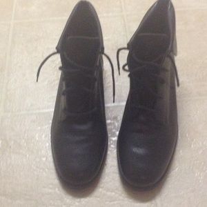 Black high top vintage shoes