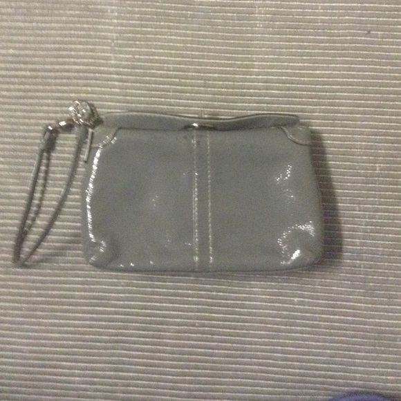 Lightly used gray purse with side pocket inside
