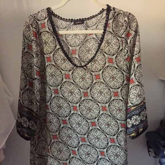 Sheer Dress with different colored designs