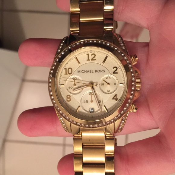 MK gold watch