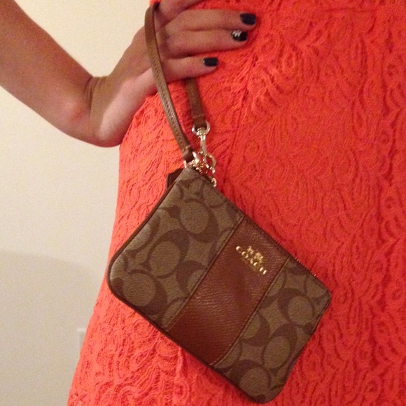 COACH Wristlet with Brown Stripe. I have 2.