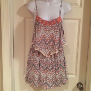 Multi colored racerback romper with trim