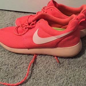 Bright pink/orange Nike Roche shoes