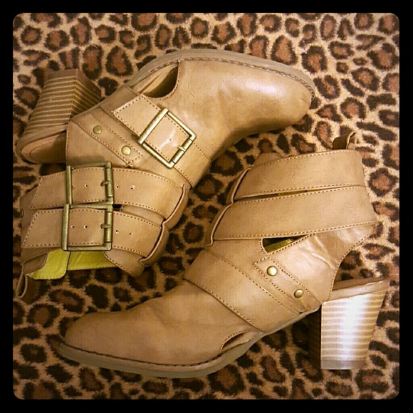 Brown leather booties with exposed heel