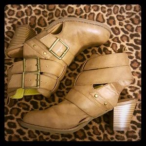 Brown leather booties with exposed heel