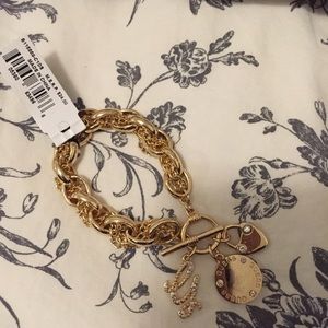 gold guess charm bracelet