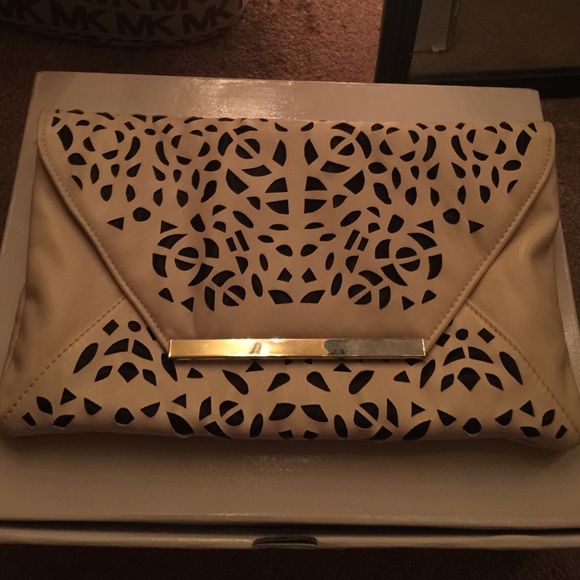 Beige and black cut out clutch