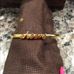 Kate Spade "cheers" script cuff bracelet
