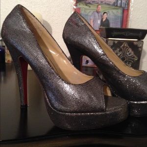 Sparkling silver heels with red sole!