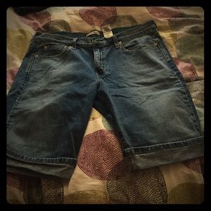 Washed denim Bermuda shorts.