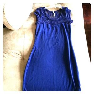 A mini blue lace dress
