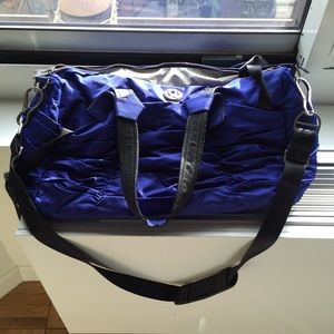 Electric blue lululemon yoga/weekender bag.