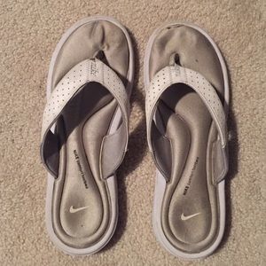 White Nike flip-flops!