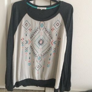 A long sleeve patterned shirt