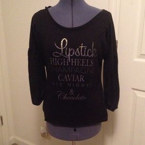 Graphic tee; 3/4 length sleeve; black and gold