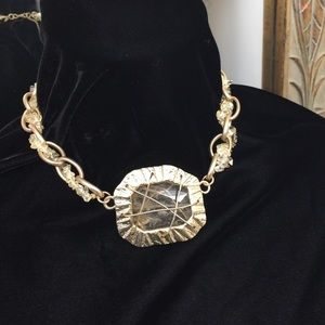Beautiful caged stone necklace