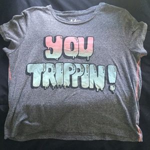 a "you trippin!" tee