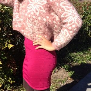 Both the sweater and skirt are for sale.