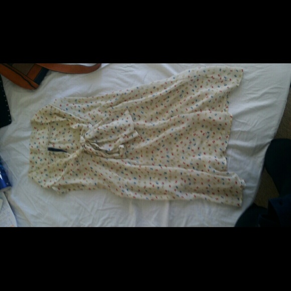 White blouse with bow pattern