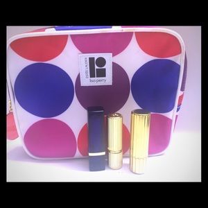 3 Estēe Lauder lipsticks *includes makeup bag