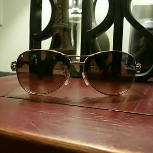 Gold aviator glasses