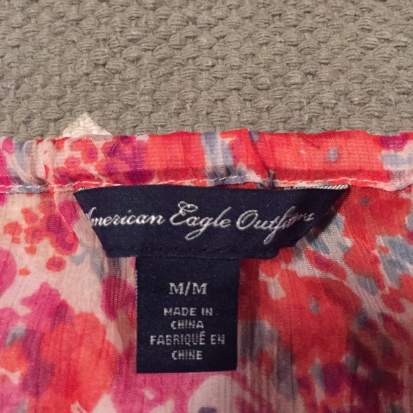 Floral tank. - Picture 2 of 3
