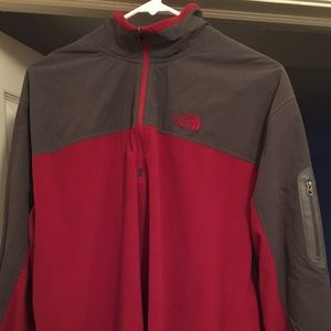 Men's North Face quarter-zip pullover jacket.