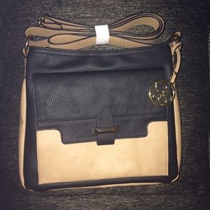 Jessica Simpson beige & black cross body bag.