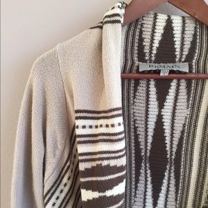 Open wrap style sweater with Aztec print