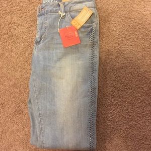 Mossimo light wash skinny jeans with rhinestones