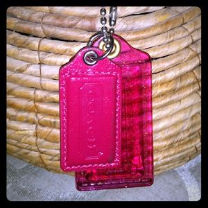 Sparkly and solid pink coach hang tags